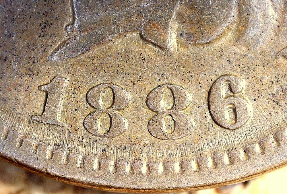 1886 Indian Head Penny Repunched Date variety showing secondary digit impression on the final 6 of the date