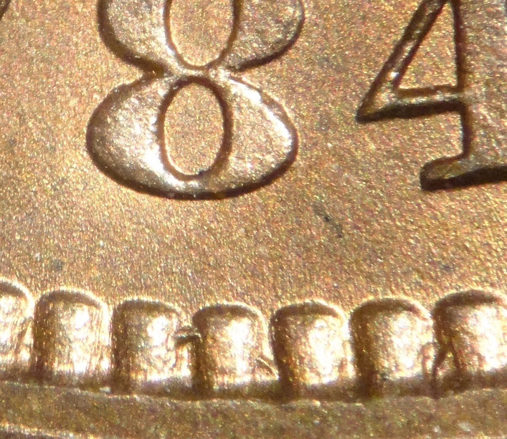 1886 Indian Head Penny Misplaced Date MPD-001 showing errant digit traces in the denticles below the date